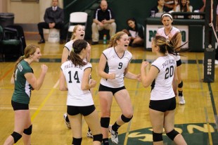 Palo Alto High School volleyball celebrates a point during a victory over Menlo-Atherton High School in the CIF NorCal Championship last year. The team has big shoes to fill this upcoming season