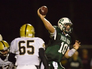Quarterback Keller Chryst throws deep downfield in Paly's home opener loss against Archbishop Mitty High School Friday night.  Photo by Matt Ersted.