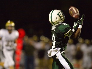 Wide receiver Malcolm Davis hauls in a long pass from quarterback Keller Chryst for a 64 yard touchdown in Paly's home opener loss against Archbishop Mitty High School Friday night.  Photo by Matt Ersted.