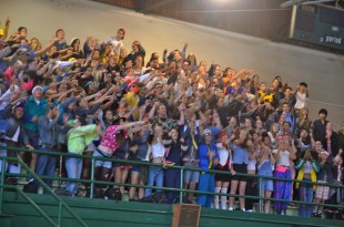 The seniors of 2013, dressed in 90's clothing, pass on the spirit chant to the freshman. [Photo: Cathy Rong]
