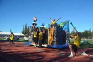 Juniors cheer on the roaring crowd at the end of their Spirit Dance. [Photo: Cathy Rong]
