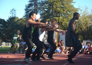 Michael Johnson ('12) dances to "Can't Touch This" by MC Hammer during the seniors' spirit dance. [Photo: Cathy Rong]