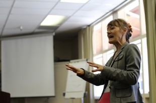 School Board President Camille Townsend answers questions in the English Resource Center during tutorial.