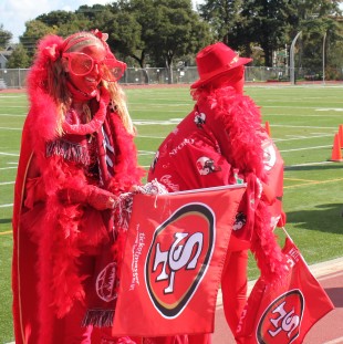 The two sophomore best-dressed competitors show their costumes to the judges. Photo by Phoebe So.