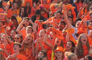 The Freshman dressed in orange, their class color, cheer during the rally at lunch. Photo by Phoebe So.