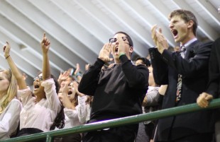From the Junior bleachers, pumped attendees cheer for their class. [Photo: Cathy Rong]