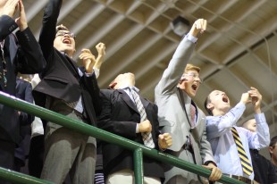 Juniors cheer from the bleachers during the Spirit Rally after school. [Photo: Cathy Rong]