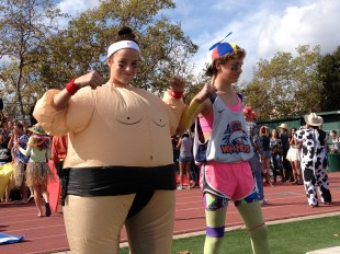 Two freshmen show off for the judges as the best dressed for "healthy choice" salad dressing.  The freshmen will dress in orange tomorrow.  Photo by Jared Schwartz.