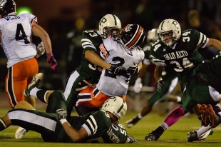 Senior Linebacker Erik Anderson stuffs the Los Gatos running back in the second quarter of Paly's 25-7 victory over the Wildcats Friday night.  Photo by Matt Ersted.