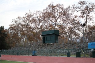 Construction begins as the wood of the bleacher seats have been removed.