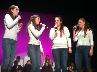 The Heartbeats perform The Beatles' "Here Comes the Sun." The group is the female answer to the all-male Heartbreakers. From left to right: junior Sarah Ohlson, senior Isabel Benatar, sophomore Jamie Garcia and junior Hannah Wilson. Photo by Paige Esterly.