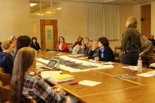 Penny Ellson, chair of the PTA's Traffic Safety Committee, introduces the traffic safety improvement project to Paly PTSA at the Feb. 21 meeting. If passed, this project may improve bike and pedestrian safety at Paly while relieving congestion Churchill Avenue.