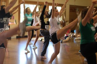 Students perform kicks in an exercise led by current members of the varsity cheerleading team. This past year has been a successful one for Paly Cheer. "We had a blast bonding at cheer camp, cheering for our football team ... and competing at Cheer Nationals in Las Vegas," said Haley Hammer, head coach of the Spirit Squad.
Photo by: Juliana Moraes-Liu