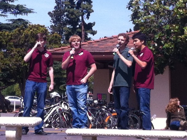 The Heartbreakers, Paly's only all-male a capella group, performed both "Uptown Girl" and Paly's rousing fight song "Green and White Forever." Photo by Paige Esterly.