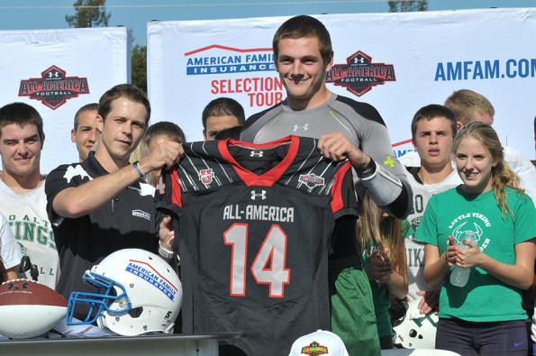 Senior quarterback Keller Chryst was presented his honorary game jersey for the Under Armour All-American Game today on the football field. Chryst, the top-rated pocket-passing quarterback in nation for the Class of 2014, will be taking his talents to Stanford University next fall. Photo by Paul Bienaime