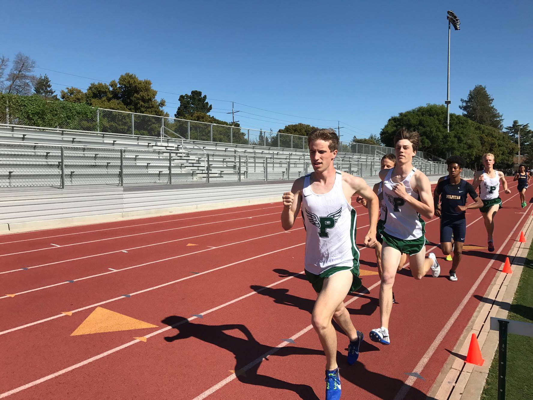 Junior Sam Craig leads the varsity boys' 1600-meter run at the Tuesday afternoon meet versus Milpitas. The boys' varsity team dominated Milpitas, while the other divisions saw closer matchups. "I thought the team did very well overall," junior sprinter Daniel Nemeth said. "The underclassmen have really stepped up." Photo: Jevan Yu.