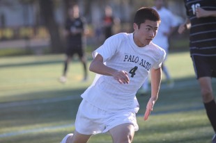 Senior captain Kirby Gee chases down a ball during Paly's 2-0 victory over Gunn earlier this season. The Vikings lost in the CCS quaterfinals last week, but still earned a promotion back to the De Anza League.