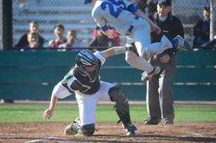 Junior catcher Austin Krohn tags out a St. Ignacius player ay home plate in Paly's 9-3 loss to the Wildcats Wednesday afternoon.  Photo by Matt Ersted.