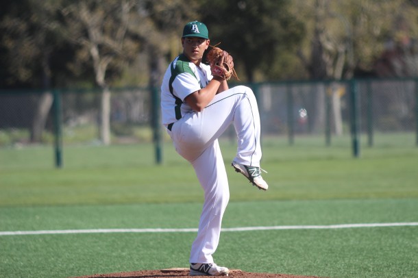 Junior pitcher Danny Erlich winds up to pitch against Gunn on Friday. Erlich held the Titans to just two runs, both in the first inning. "Danny's pitching really helped us get our momentum back later on," senior designated hitter Isaac Feldstein said. Photo by Neal Biswas.