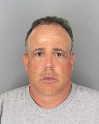 Former Paly baseball coach Joel Kaufman has been charged with a series of crimes, including child molestation. Kaufman is still at large and the Orinda Police Department is currently looking for him. Photo from the Contra Costa Sheriff's Office.