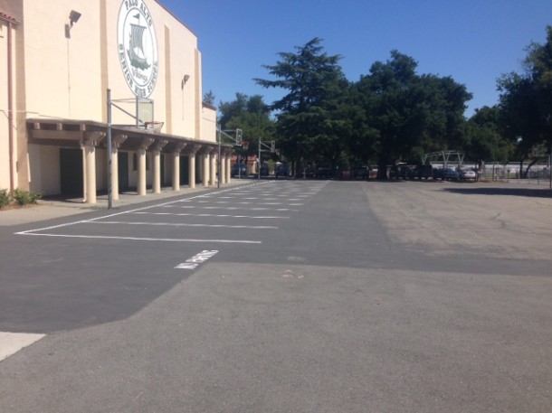 The hard courts in front of the Big Gym have been converted into a staff parking lot. Photo provided by Kimberly Diorio.