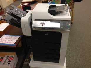 The library bought two new printers to replace its old one.
