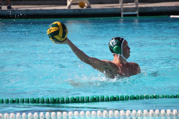Senior Ethan Look passes the ball in the boys' water polo team's first league game. The Paly boys lost to Gunn High school 7-14. Photo by Julianna Heron.