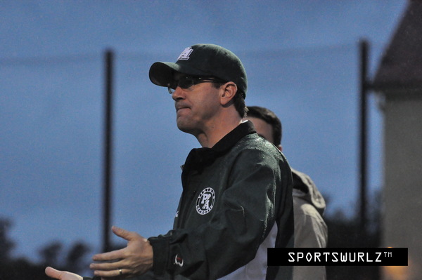 The Paly boys' lacrosse ex-head coach Craig Conover talks to the referee during a game last season. Conover recently announced that he would be leaving the team this year for a new position he accepted at a start-up company. The Vikings' season begins in Feb. 2014. Photo from sportswurlz.com