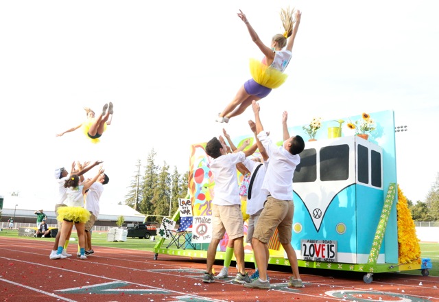 Juniors dance around their float, themed after 'Yellow Submarine." Photo by Cathy Rong. 
