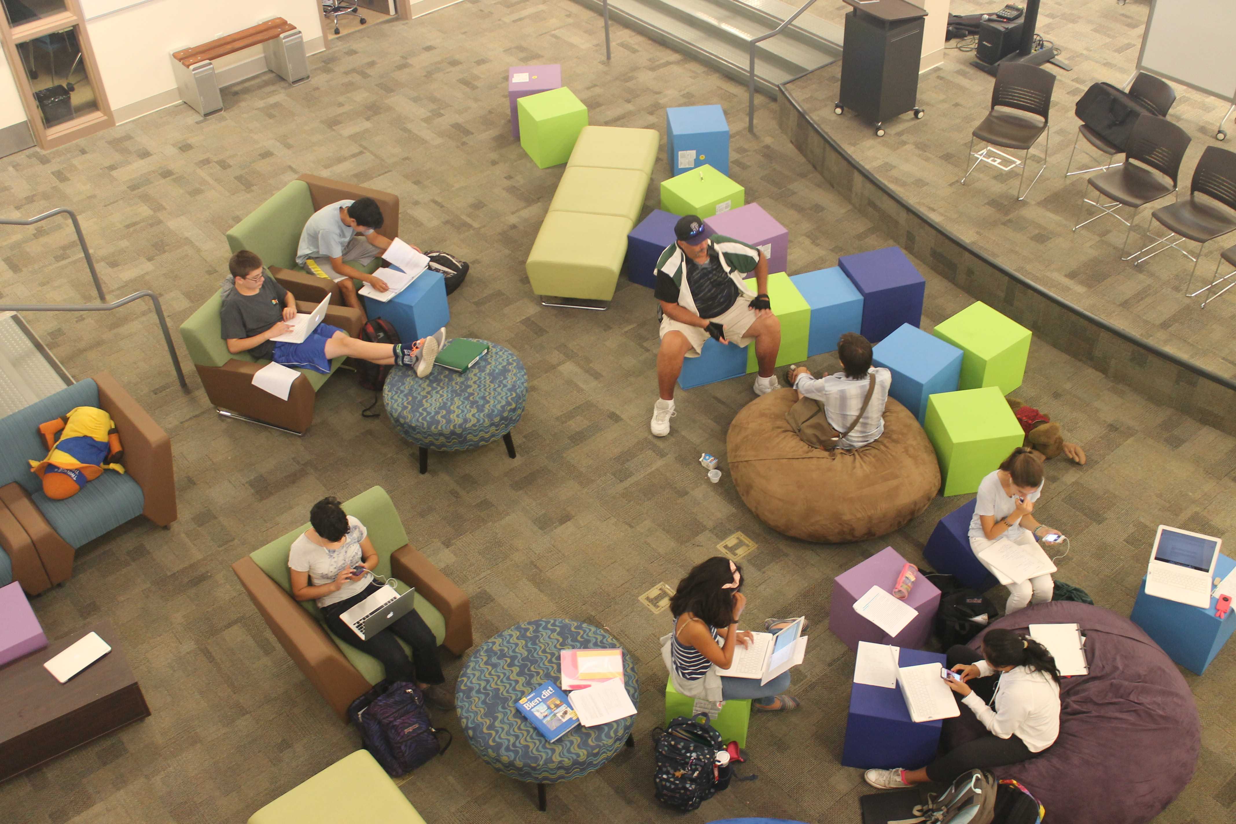 Students enjoy the new, modern furniture of the Media Arts Center. Photo by Adele Bloch.