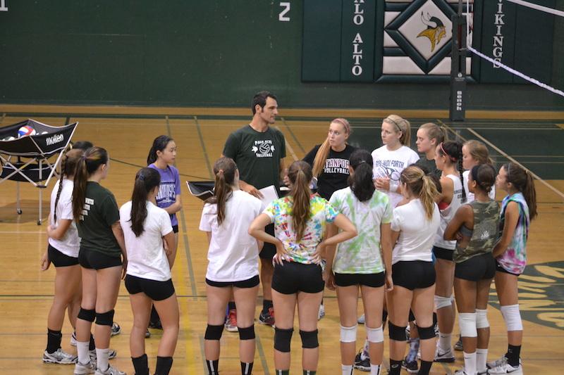 The Palo Alto High School girls' volleyball team discusses season plans before practice. Photo by Amy Leung.
