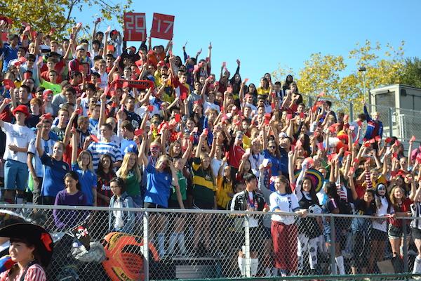 The class of 2017 dons soccer uniforms in honor of their theme "red card" during spirit week 2014. The theme was also a result of a re-vote after controversy over their first theme. Photo by Adele Bloch.