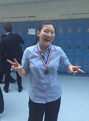 Junior Jenny Xin celebrates after going undefeated at the Coast Forensic League Tournament at South San Francisco High School this weekend. Photo by Anna Nakai.