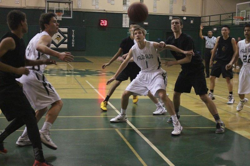 Sophomore forward Max Dorward boxes out his opponent in a home game against Wilcox High School last season. The team went on to Central Coast Section playoffs, losing against Santa Teresa high school and ending their season. Photo by Josh Yuen. 