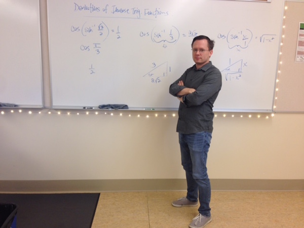 Math teacher Dave Peters presents the inverse trigonometry derivatives his BC Calculus students are learning. This is his first year teaching the BC Calculus lane, having previously taught AB Calculus. Photo by Ana Caklovic. 