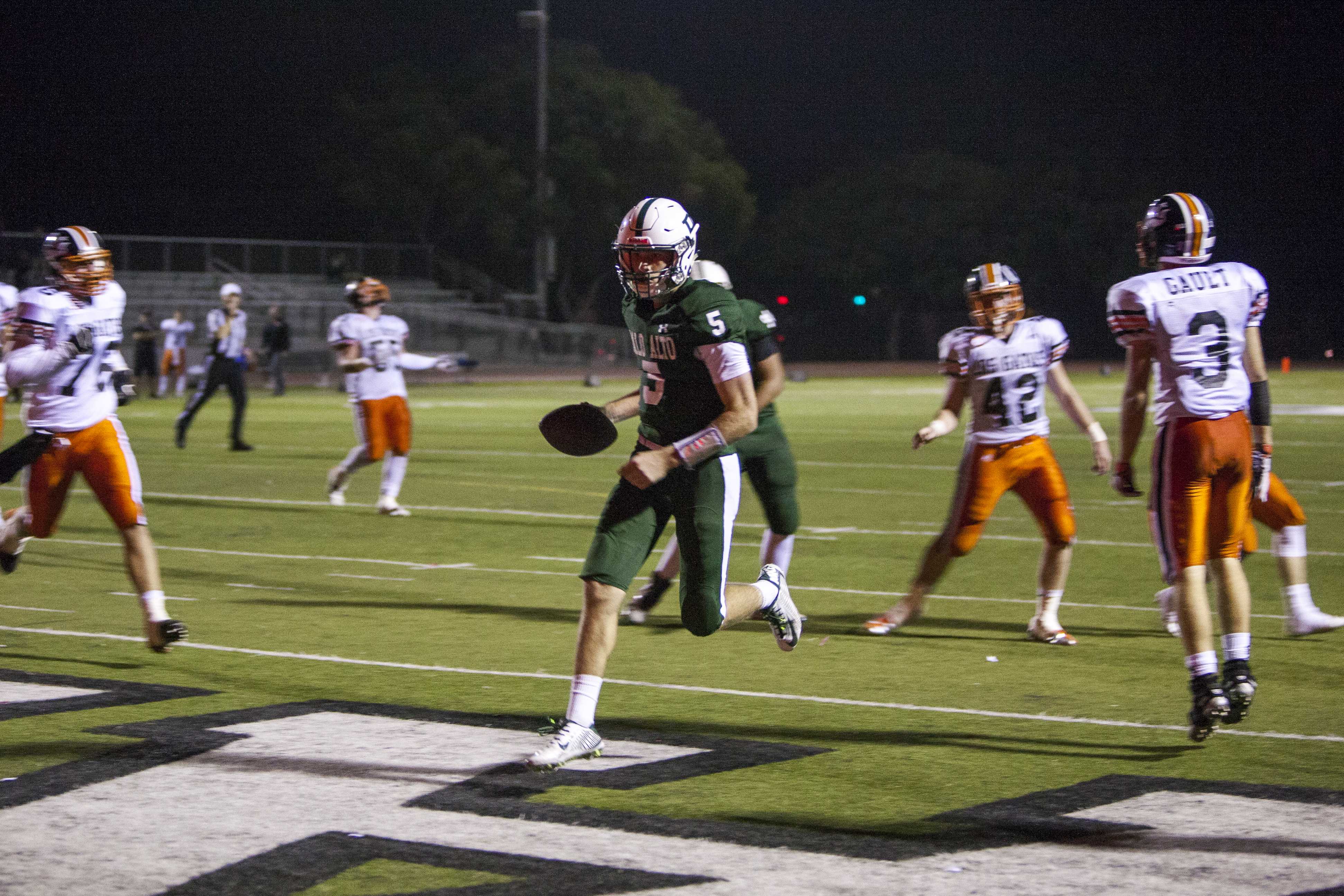 Senior quarterback Justin Hull runs the ball into the end zone for a touchdown. The Vikings' fell to the Los Gatos Wildcats on Friday night at Viking Stadium, a devastating loss for Paly's homecoming game.