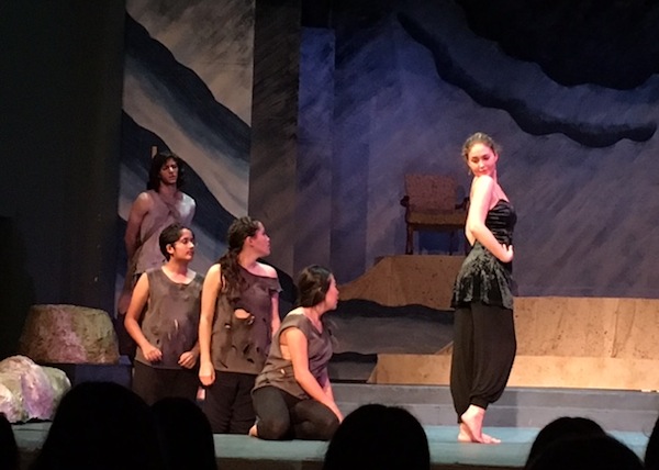 In "The Odyssey," Odysseus (senior Ophir Sneh) must journey through many perils across the ocean before making it home. Sirens, such as the one played by senior Clara Baker above, entice the sailors with their singing and dancing. Photo by Ana Caklovic
