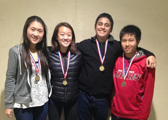Sophomores Frances Zhuang and Tanay Krishna, junior Candace Wang, and freshman Leyton Ho celebrating with their awards after the LD tournament.