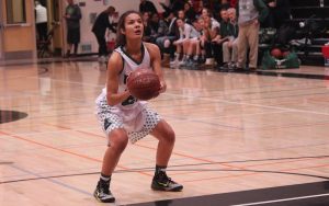 Girls' basketball dominates cross-town rival