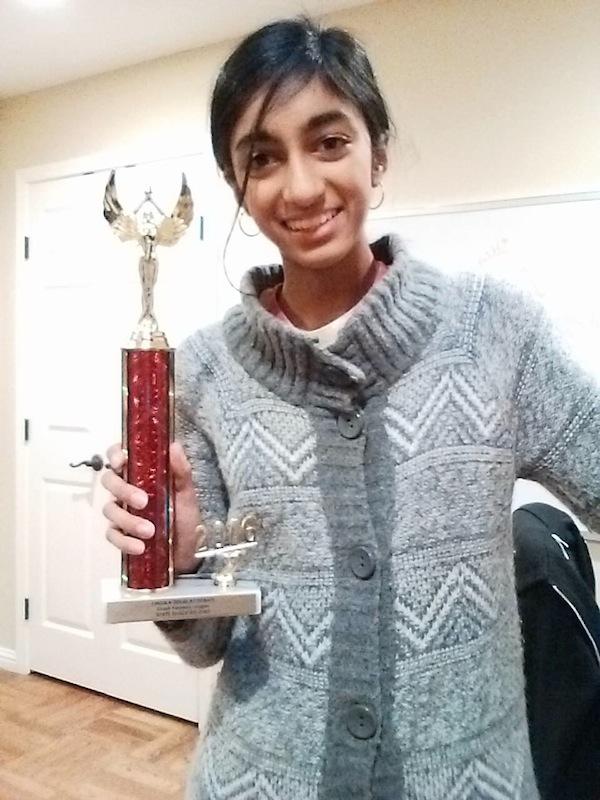 Junior Madhumita Gupta poses with her trophy after qualifying for the Lincoln-Douglas State Championships. "The only reason I did well was because of my teammates and my coaches," Gupta said. "I never thought I could do this at the beginning of the year, but through practicing hard, working hard and accepting tough criticism, I finally achieved my goal." Photo: Madhumita Gupta.