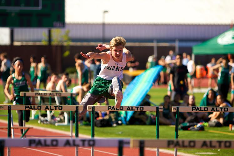Sophomore Darby Felter competes in the 110 meter hurdles. Felter would go on to win this event as well as the 300-meter hurdles. The vikings' relied on Felter and other underclassmen to fill the shoes of runners who had left due to a band trip. Photo by Cooper Lou