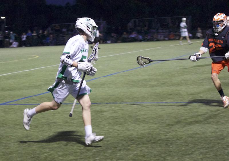 Freshman attacker Patrick McIntosh drives down the right side of the field while surveying the field for open teammates. McIntosh finished the game with one goal and two assists. Photo by Sam Lee.