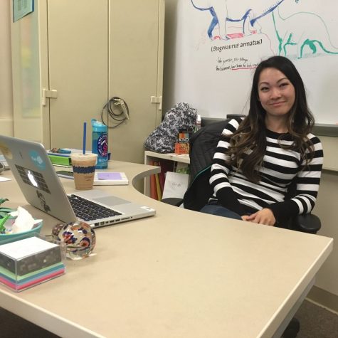English and Humanities teacher Mimi Park sits at her desk with an iced latte while discussing her   career change.  