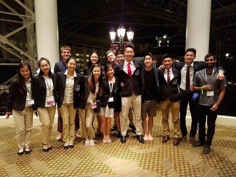 Palo Alto High School and Gunn High School students pose together at the International DECA competition in Nashville, Tenn. Four of the six Paly students pictured above were the first to ever qualify for the competition. Students from left to right: Hannah Pan (Paly), Allison Wu (Paly), ---, Stephanie Cong (Paly), 