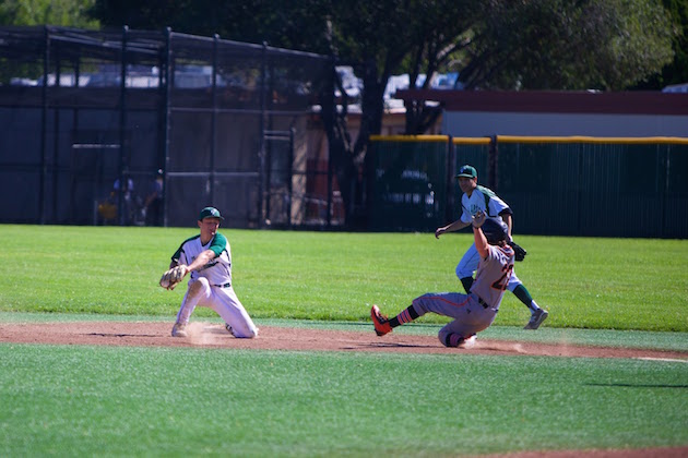 Junior shortstop Ethan Stern prepares to place a tag on an incoming Los Gatos runner. The Vikings lost to the Wildcats, 7-4, during a league game in April.
Photo by Cooper Lou. 