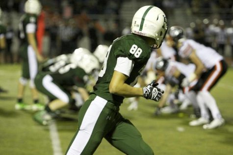 Senior wide receiver Nick Smallwood prepares for the snap. Paly would go on to lose to Los Gatos 21-7. Photo: Jackson Doerr