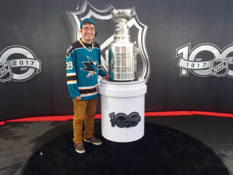 Junior Bradley Smith poses in front of the one and only Lord Stanleys Cup, given to the champion of the NHL