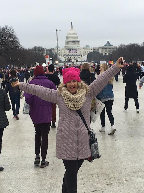 Palo Alto High School math teacher Deanna Chute celebrates her arrival at the women's march in Washington D.C on the morning of January 21. According to Chute, the event was both awe inspiring and unifying for members of all nationalities, ethnicities, genders, and sexual orientations. "My response was this feeling that everyone was there, and it felt like there wasn't anybody who wasn't represented there," Chute said. Photo: Laura Bricca 