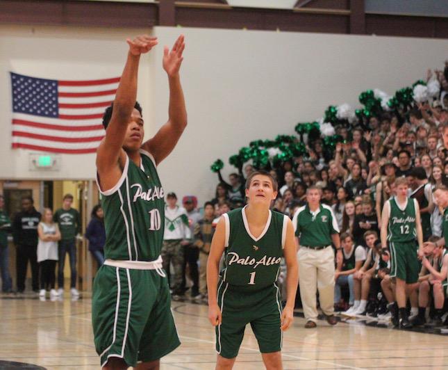 Senior guard Paul Jackson takes a free throw at Gunn while the Paly student section looks on. Palo Alto went onto win the game comfortably, 80-50. Diepenbrock says the rivalry stakes of playing Gunn wont affect Palys gameplan. We will just treat this game like we treat all of our other games and just focus on ourselves and what we are trying to do to play better, Diepenbrock said. Photo: Maya Rueven

