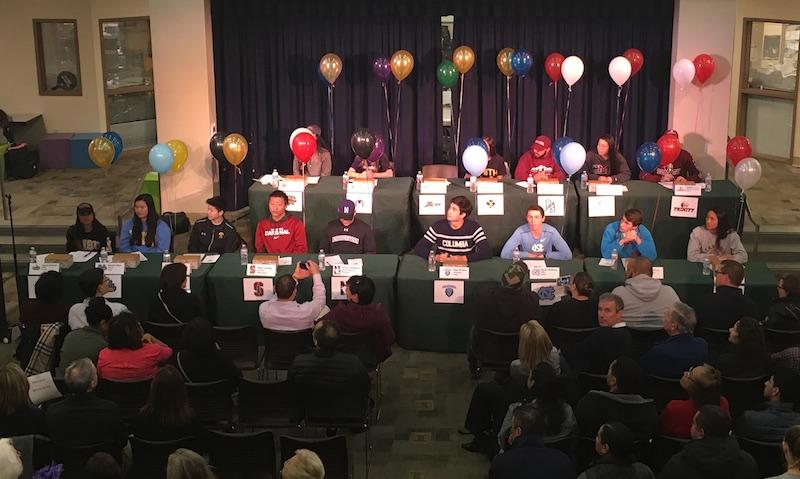 15 senior athletes commit to schools on National Signing Day